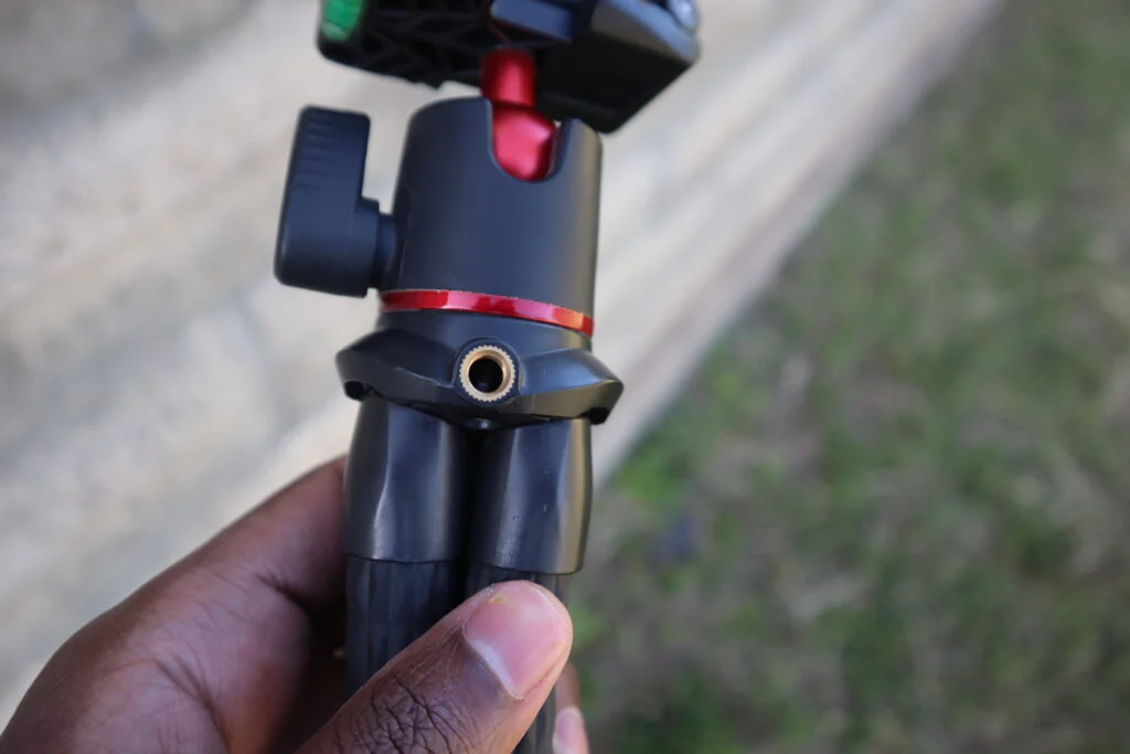 A picture of Ulanzi MT 11 cold shoe that lets you attach auxiliary equipment to the tripod