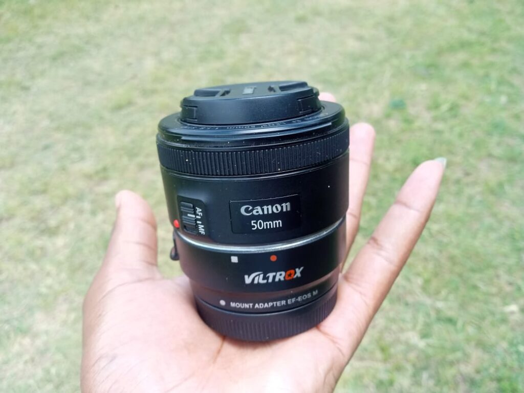 This picture shows the Canon EF 50mm f/1.8 stm lens mounted on the Viltrox EF-EOS M Lens mount adapter.