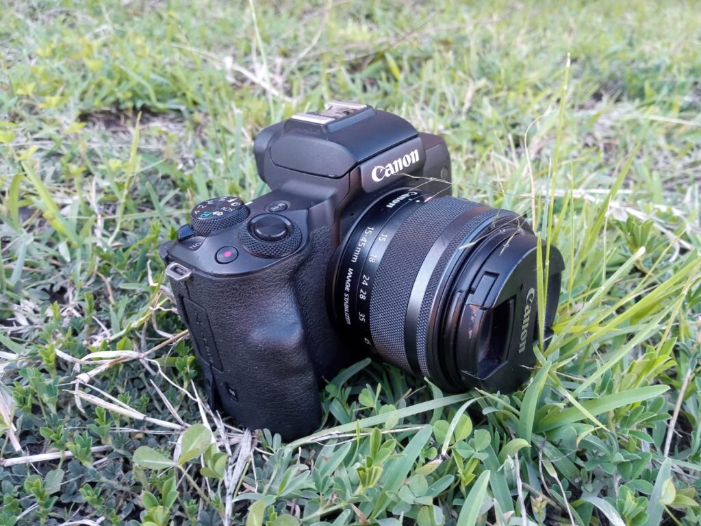 A picture of the Canon EOS M50 lying on the ground