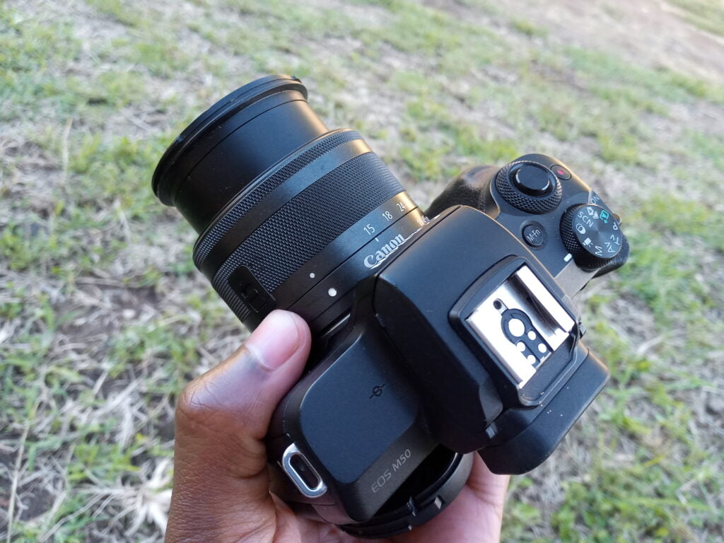A picture of me holding my Canon M50 Camera to show How To Get The Best Pictures Out Of Your Canon EOS M50 Camera